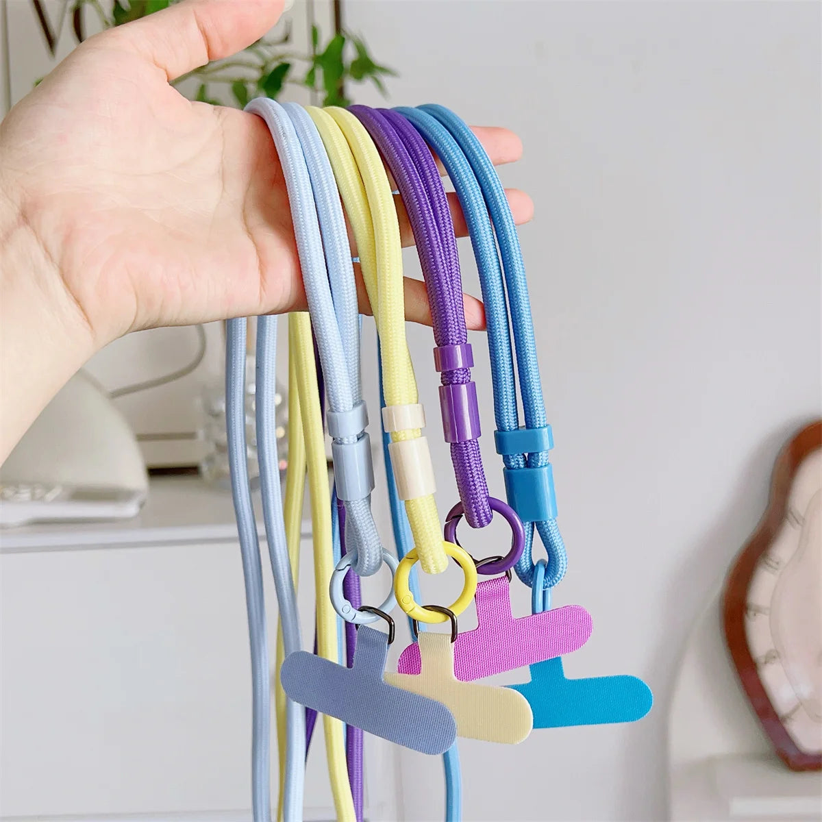 Long crossbody phone lanyard with case connection clip, view 3