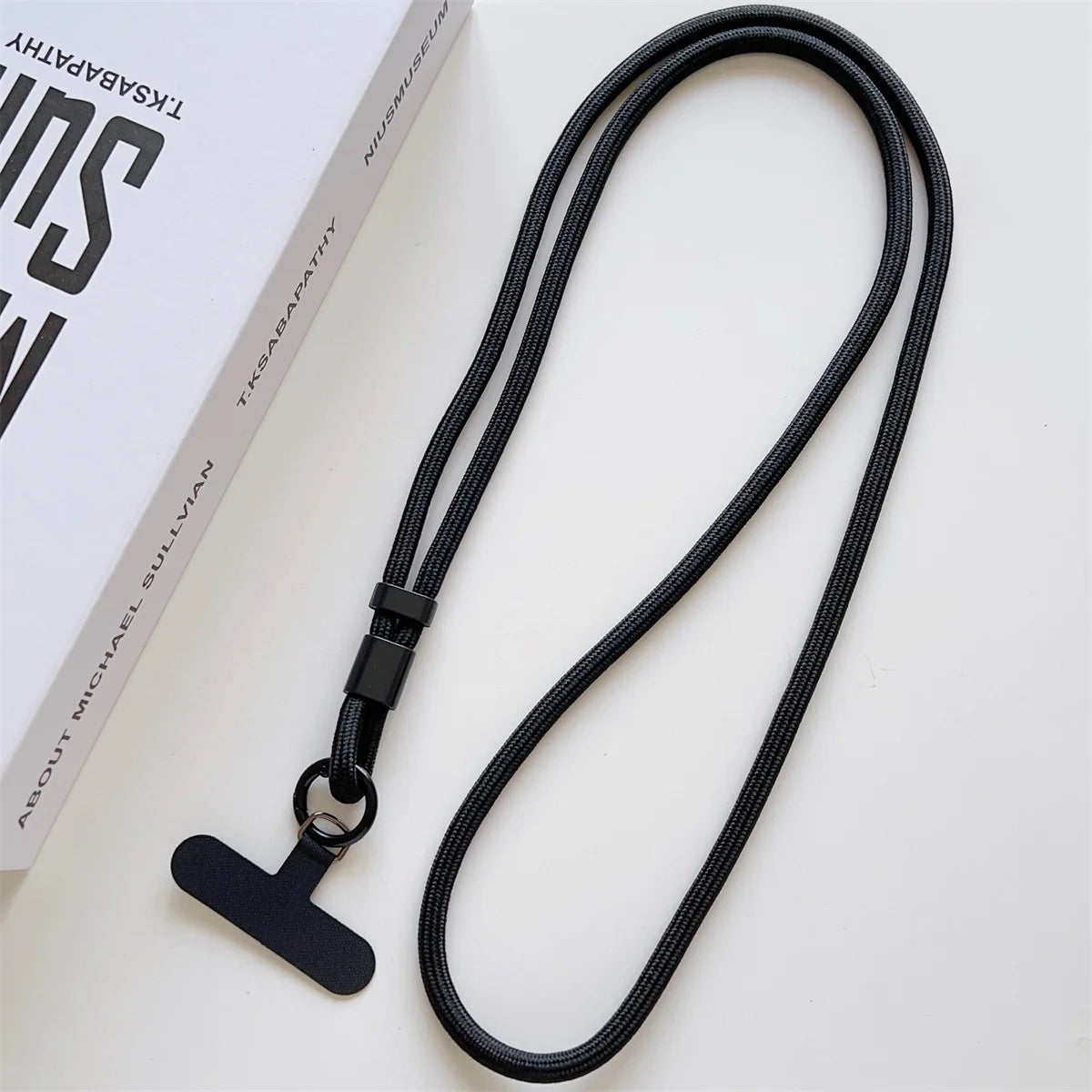 Long crossbody phone lanyard with case connection clip, black