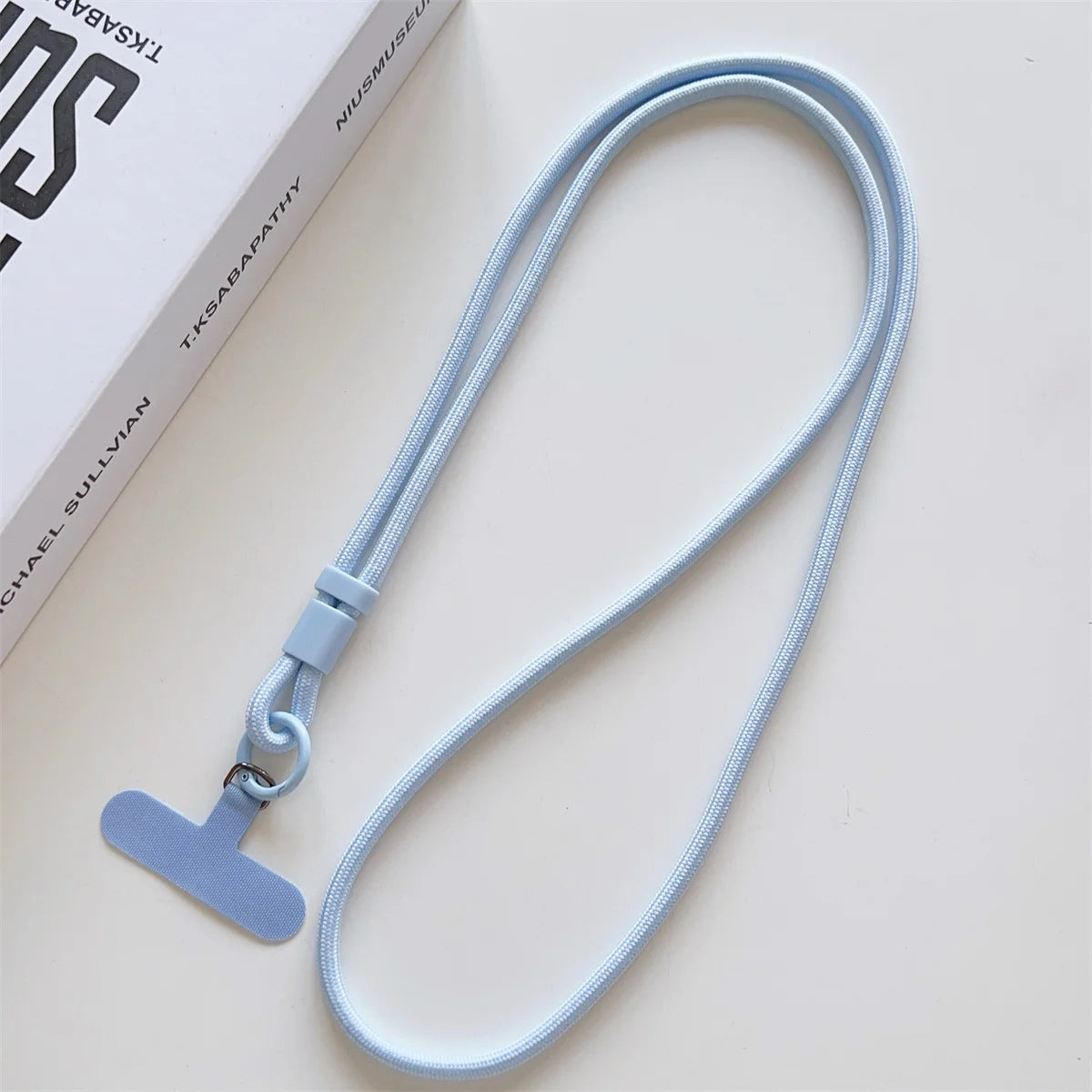 Long crossbody phone lanyard with case connection clip, light blue