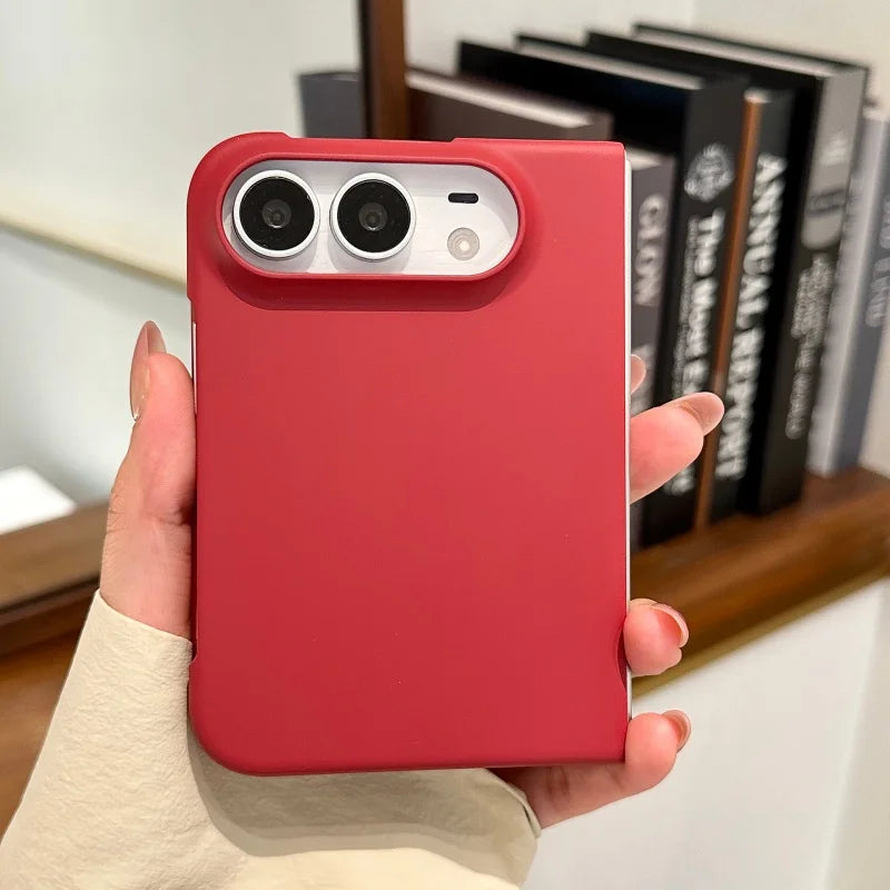 Red matte case on a closed iPhone Duo, back view in hand