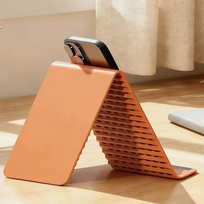 Foldable flexible silicone desktop phone holder, view 2