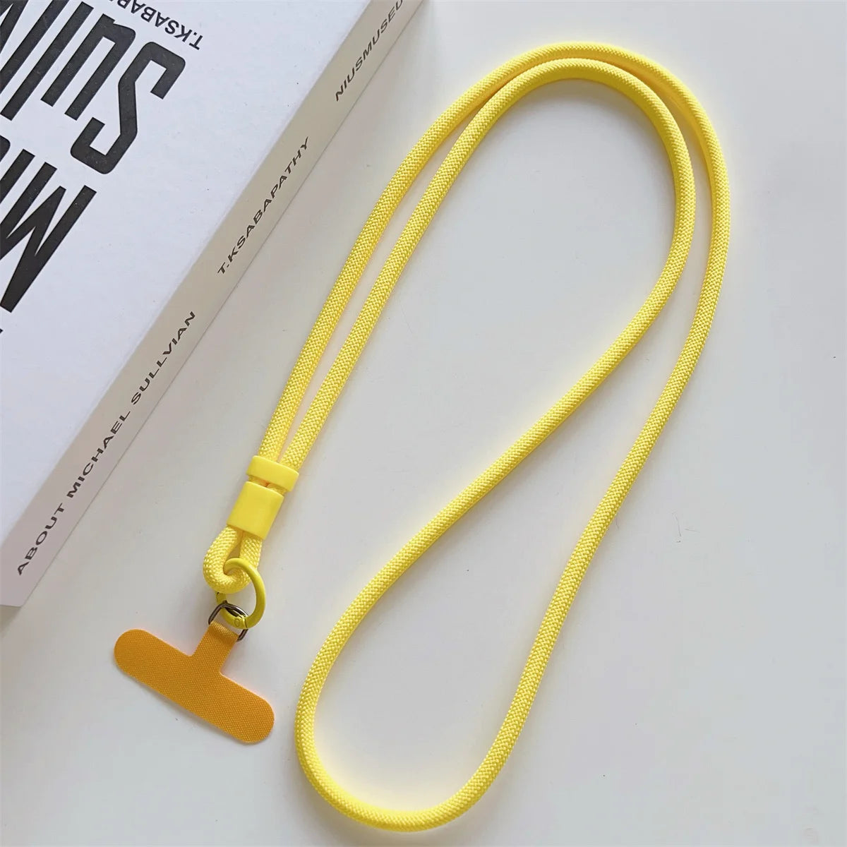 Long crossbody phone lanyard with case connection clip, yellow