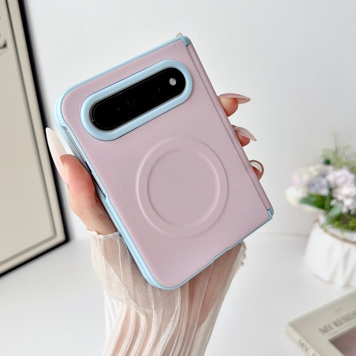 Pink leather colourblock case with blue camera rim on iPhone Duo