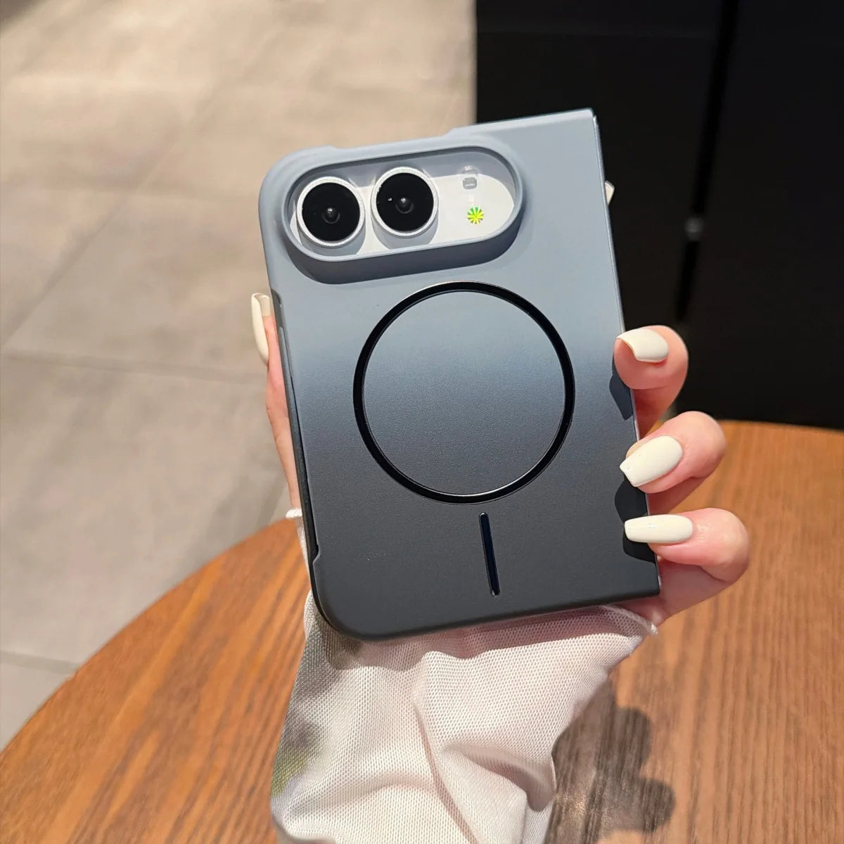 Slim matte MagSafe case on a closed iPhone Duo in grey