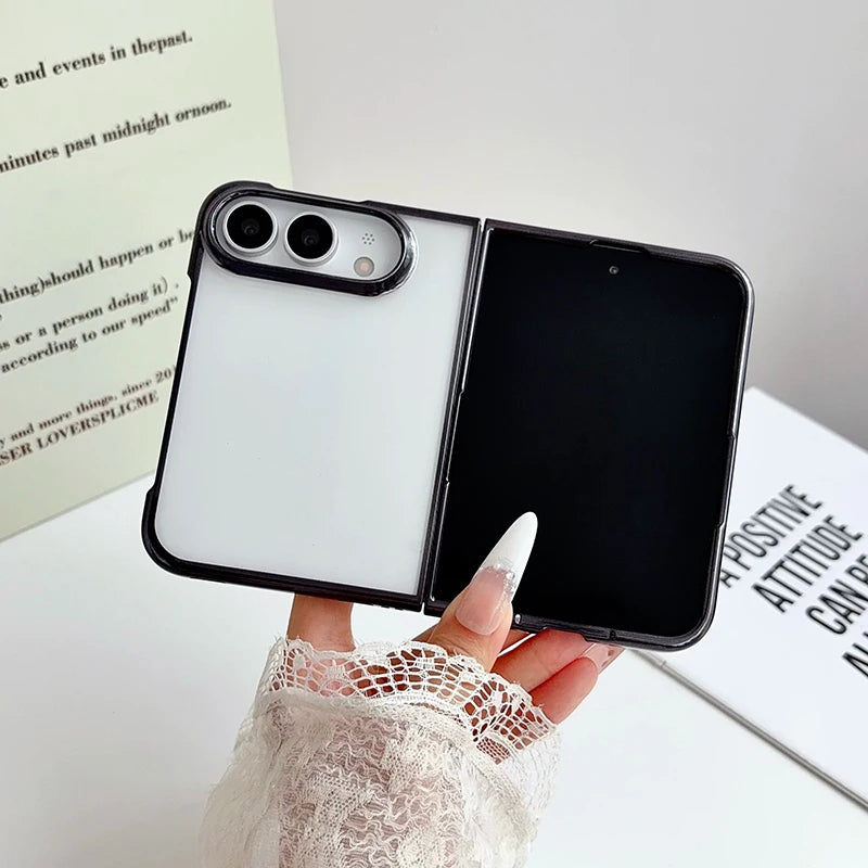 Electroplated clear case with black trim, device half open