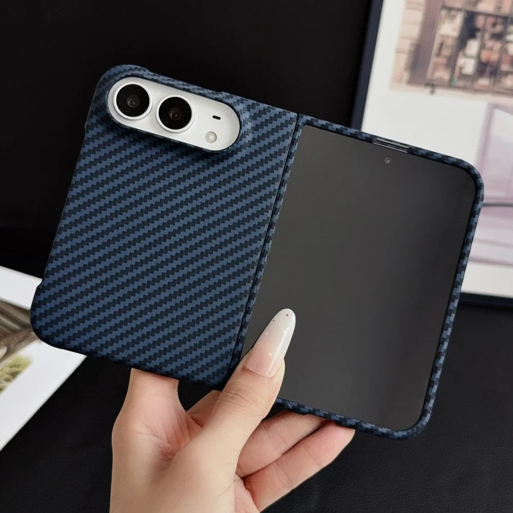 Blue carbon fibre MagSafe case on an iPhone Duo, back view in hand