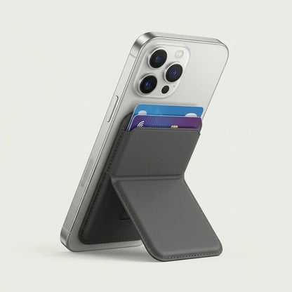 Black magnetic leather wallet card holder with fold-out stand on the back of an iPhone