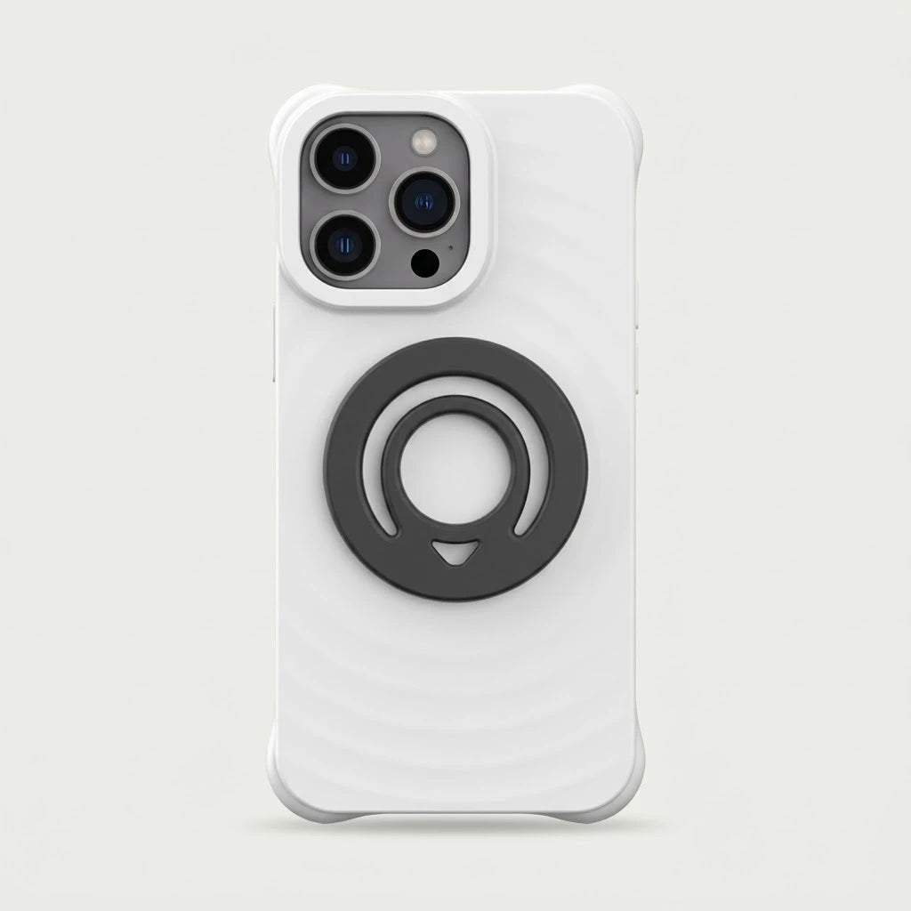 Magnetic silicone finger ring holder attached to a white phone case, studio shot