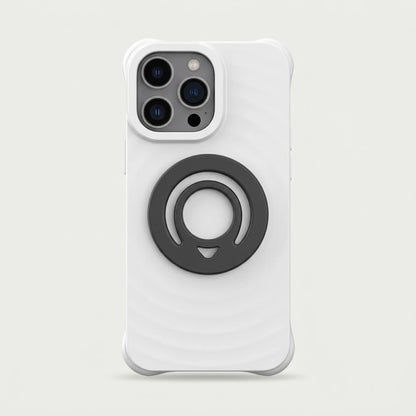 Magnetic silicone finger ring holder attached to a white phone case, studio shot