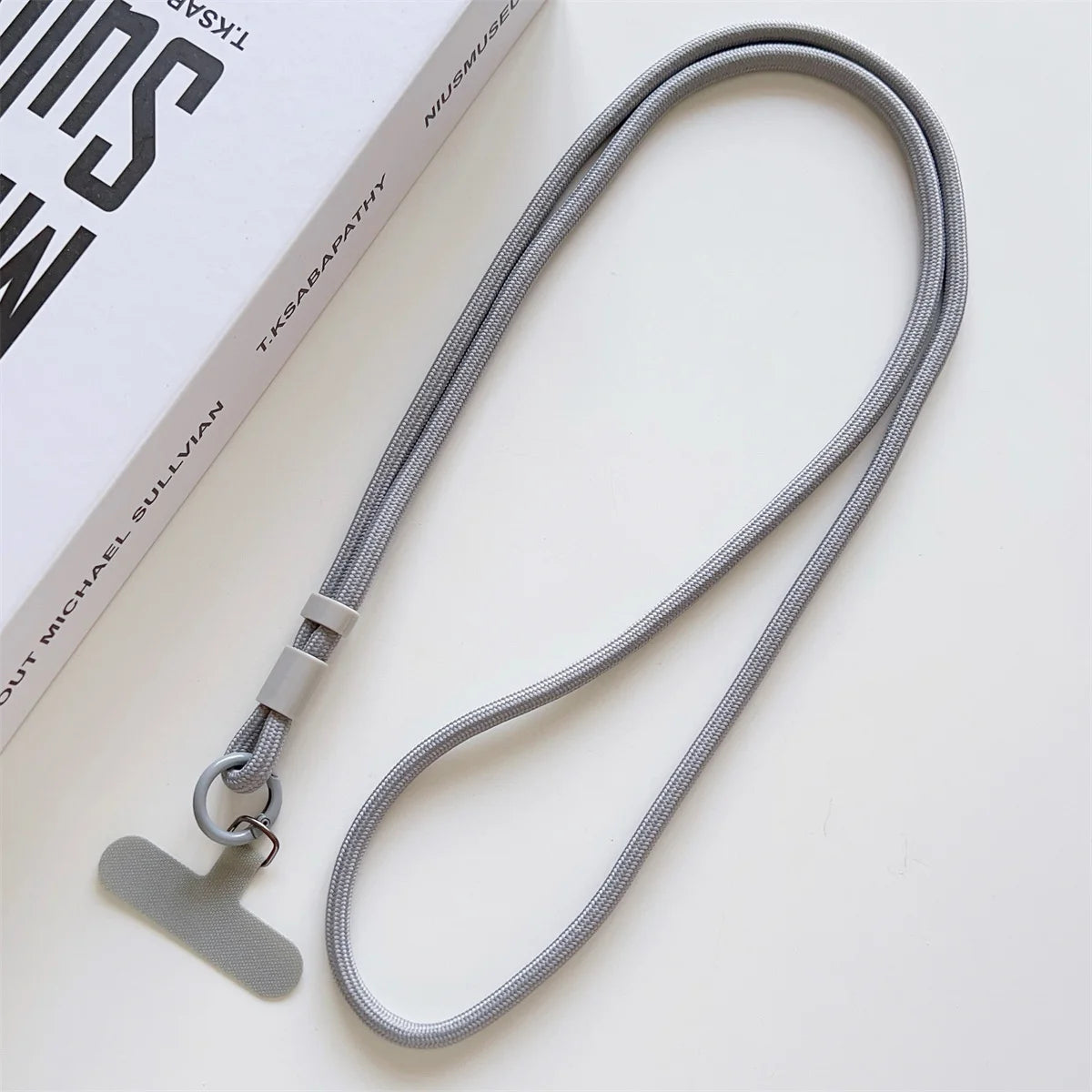 Long crossbody phone lanyard with case connection clip, gray