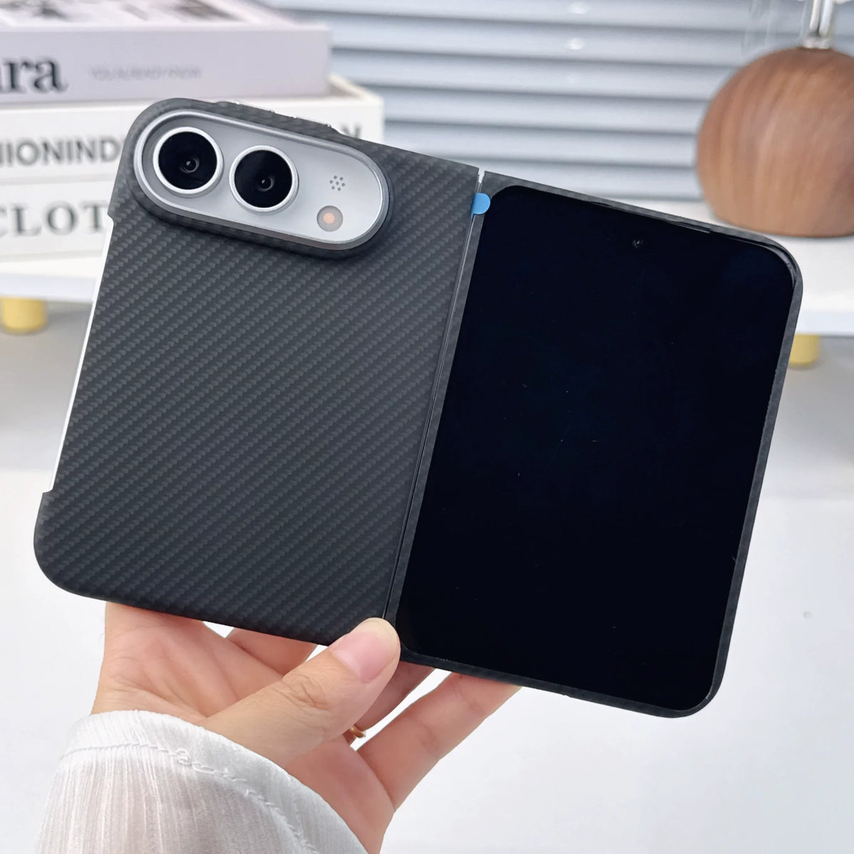Carbon fibre case on iPhone Duo opened, camera plateau visible