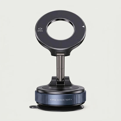 Foldable MagSafe car phone mount with suction base and magnetic ring, studio shot