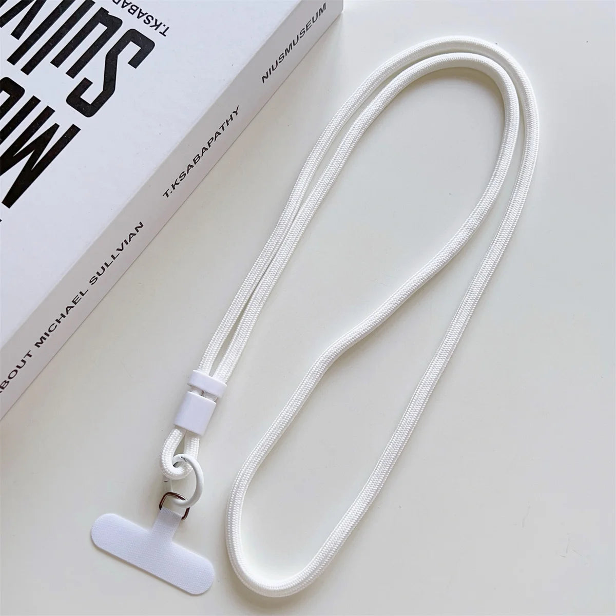 Long crossbody phone lanyard with case connection clip, white