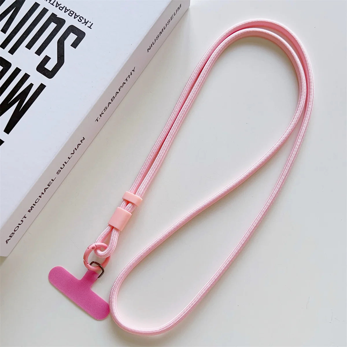 Long crossbody phone lanyard with case connection clip, pink